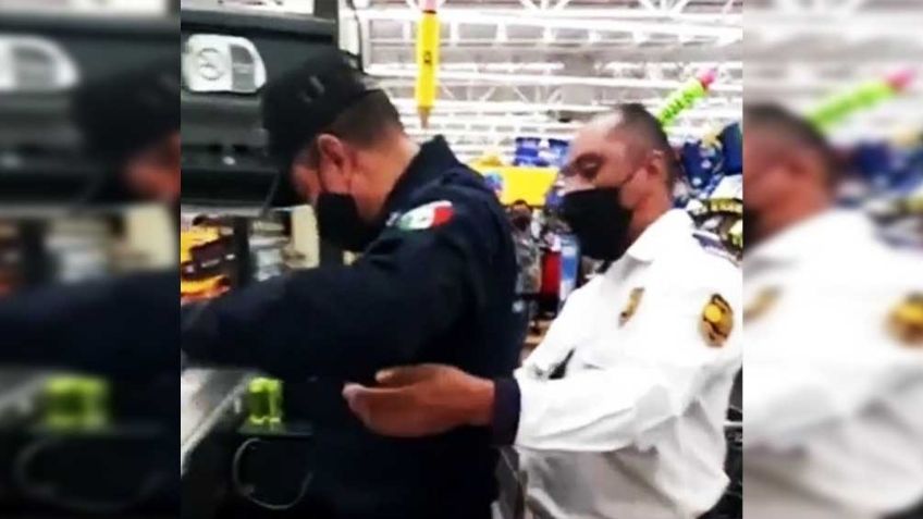 (VIDEO) 'Cachan' a policía que intentaba robar mercancía de supermercado