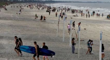 Gobernador de Florida permite reapertura de playas; cientos de personas acuden a ellas