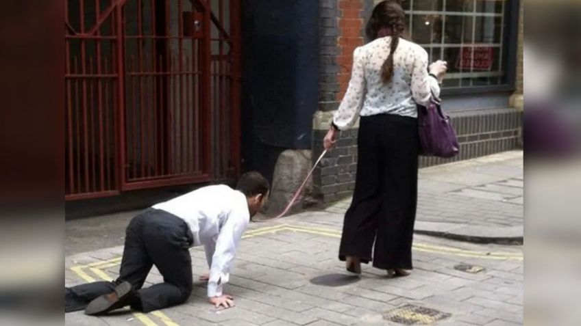 Mujer rompe toque de queda y saca a pasear a un hombre con correa; la multan