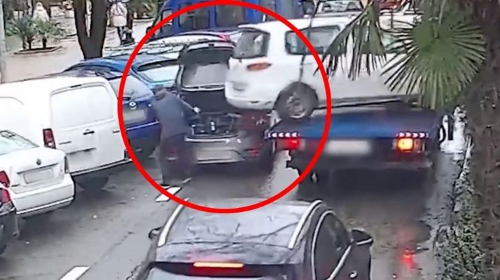 VIDEO: Automóvil se suelta de una grúa; sorprendentemente, hombre se salva de ser impactado