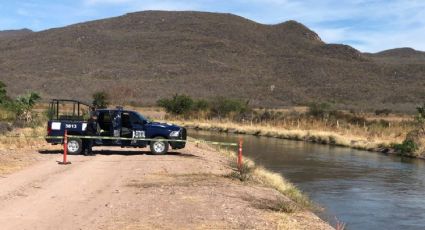 En aguas del canal de Mocorito, localizan el cuerpo maniatado de un hombre