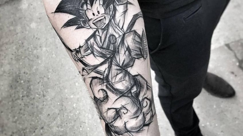 Abraza a tu niño interior con estos tatuajes para hombres en el brazo de caricaturas