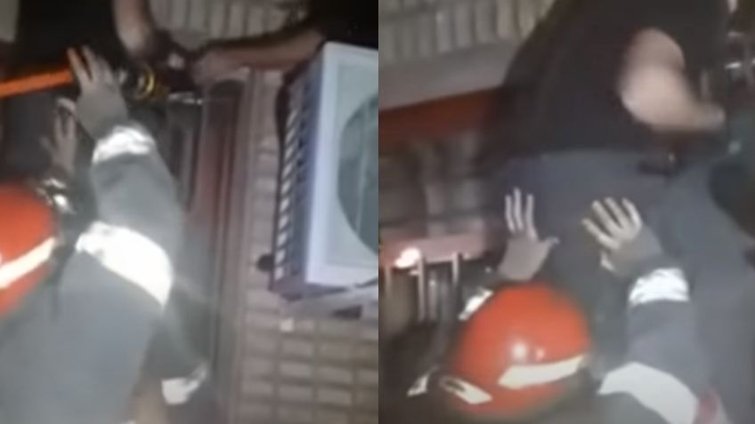 VIDEO: ¡No logró escapar! Embarazada asalta lugar y su vientre queda atorado entre barrotes