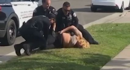 VIDEO: Suspenden a un policía por golpear en la cara a una mujer sometida durante arresto