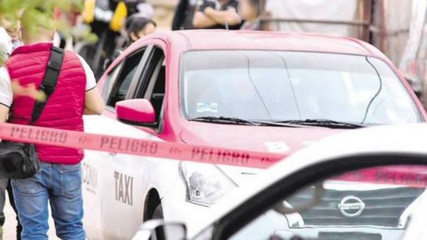 FOTOS: Sicarios ejecutan a un joven taxista en la infame 'calle de los ahorcados'