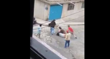 VIDEO: Familias se enfrentan a 'machetazos'; una mujer resulta lesionada