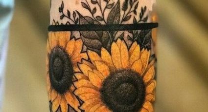 Demuestra tu fortaleza con estos tatuajes para hombres en el brazo de flores de girasol