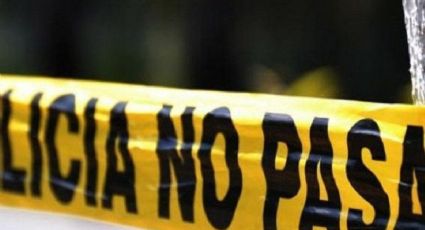 FUERTES IMÁGENES: Hallan a un cadáver en una gasolinera; murió de un balazo en la cabeza