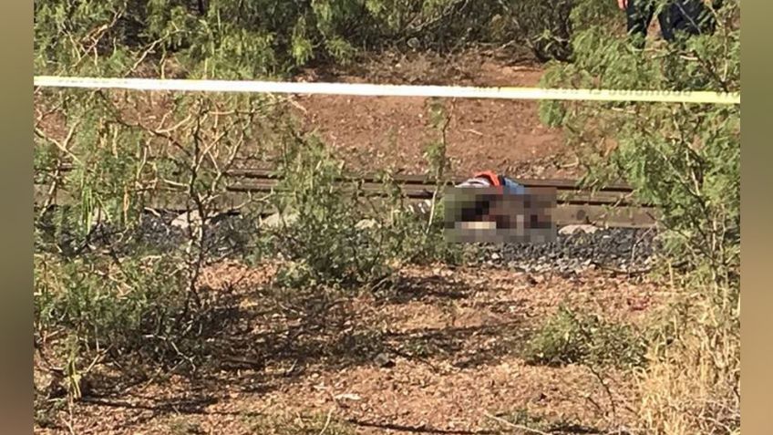 Localizan a joven sin vida a la orilla de las vías del tren; tenía una herida del torso a la cabeza