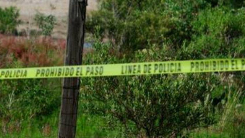 Envuelto en una cobija empapada de sangre, encuentran el cuerpo de un hombre