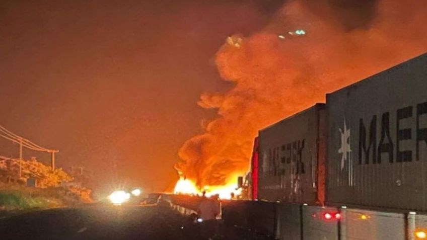 Choque entre tráileres deja a un conductor muerto tras ser calcinado