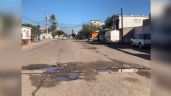Foto ilustrativa de la nota titulada Llovizna 'expone' fallas en el programa emergente de bacheo en Navojoa