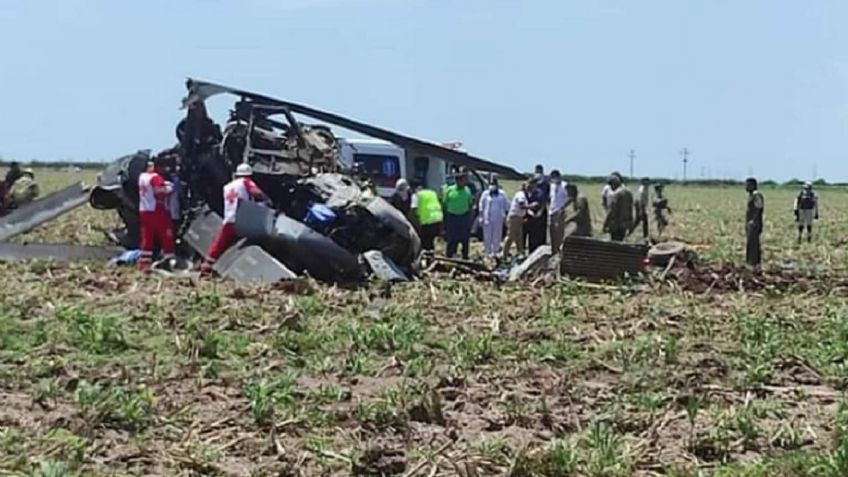 Peritos revisan área donde cayó helicóptero que dejó 14 muertos de la Marina en Sinaloa