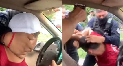 VIDEO: Grupo de Policías sacan a la fuerza a hombre de su camioneta y lo someten entre 3