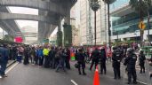 Foto ilustrativa de la nota titulada Trabajadores del poder judicial se enfrentan a policías causando caos y tráfico en la CDMX