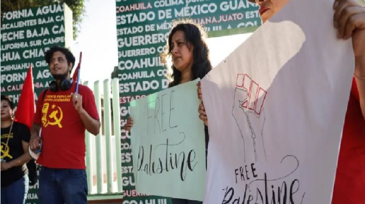 Guerra en Israel: En frontera de México y EU, migrantes protestan a favor de Palestina