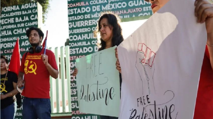 Guerra en Israel: En frontera de México y EU, migrantes protestan a favor de Palestina