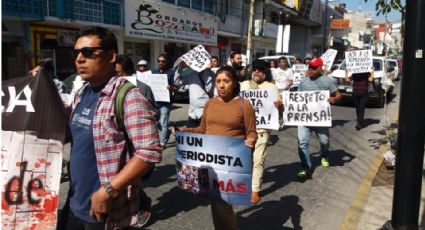 Prensa marcha contra la violencia en Guerrero; FGR termina confrontando a periodistas