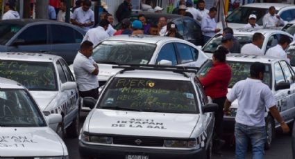 Edomex: Taxistas niegan ser "halcones" de La Familia Michoacana e impiden paso del ejército