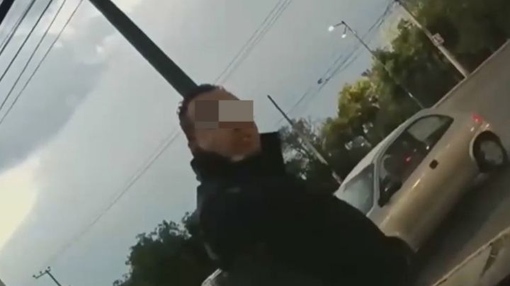 Captan a presunto policía de Coacalco cuando agrede a conductor; aseguran que lo quiso extorsionar
