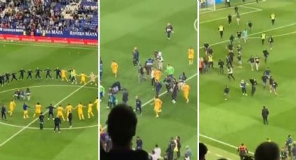 VIDEO: Ultras del Espanyol invaden el campo y obligan a huir al Barcelona que festejaba el título