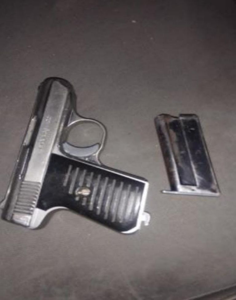 Arma de fuego asegurada 