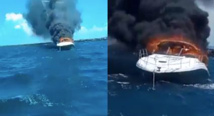 (VIDEO) De terror: Yate se incendia en Yucatán; tripulantes saltaron al mar para salvar su vida
