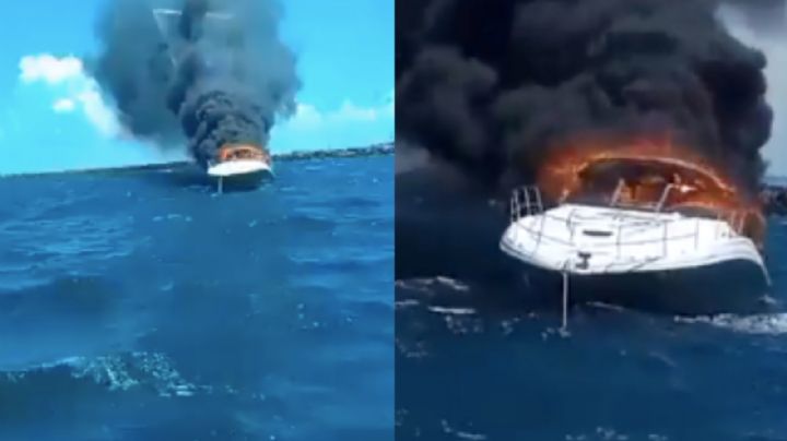 (VIDEO) De terror: Yate se incendia en Yucatán; tripulantes saltaron al mar para salvar su vida