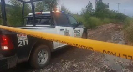 Agentes policíacos encuentran restos humanos emplayados a un costado de una brecha en Nuevo León