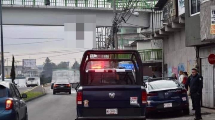 Imágenes fuertes: Cuelgan restos humanos en puente peatonal de Toluca; Familia Michoacana deja mensaje