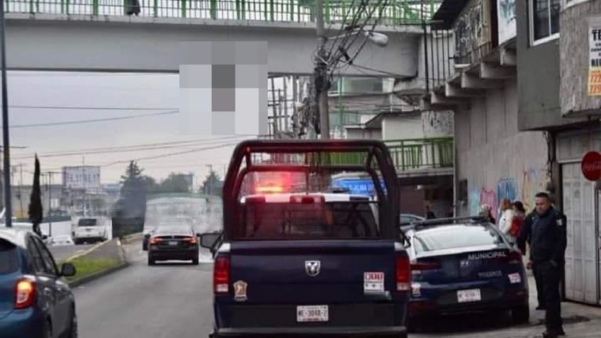 Imágenes fuertes: Cuelgan restos humanos en puente peatonal de Toluca; Familia Michoacana deja mensaje