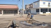 Foto ilustrativa de la nota titulada Ciudad Obregón: Ciudadanos ‘bachean’ con escombros calles en mal estado