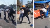 Foto ilustrativa de la nota titulada VIDEO: En plena calle, policía de la CDMX y presunto comerciante se agarran a golpes