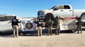Foto ilustrativa de la nota titulada Aseguran vehículos con reporte de robo, cartuchos, armas y narcóticos al norte de Sonora