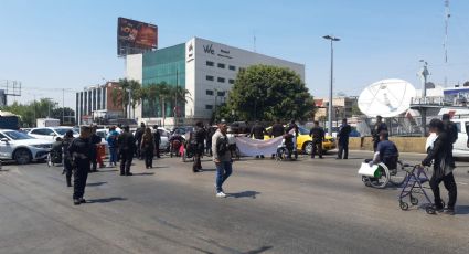 Caos en el Aeropuerto de la CDMX por pelea entre extrabajadores de Interjet y Policías