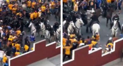 VIDEO: Hinchas de Tigres agreden a policías y a sus caballos por fuera de estadio