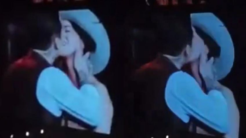 VIDEO: Christian Nodal invita a Ángela Aguilar a su concierto y protagonizan romántico BESO