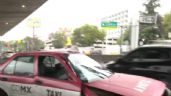 Foto ilustrativa de la nota titulada Caos en Periférico Norte por taxi abandonado en carriles centrales con dirección a Polanco
