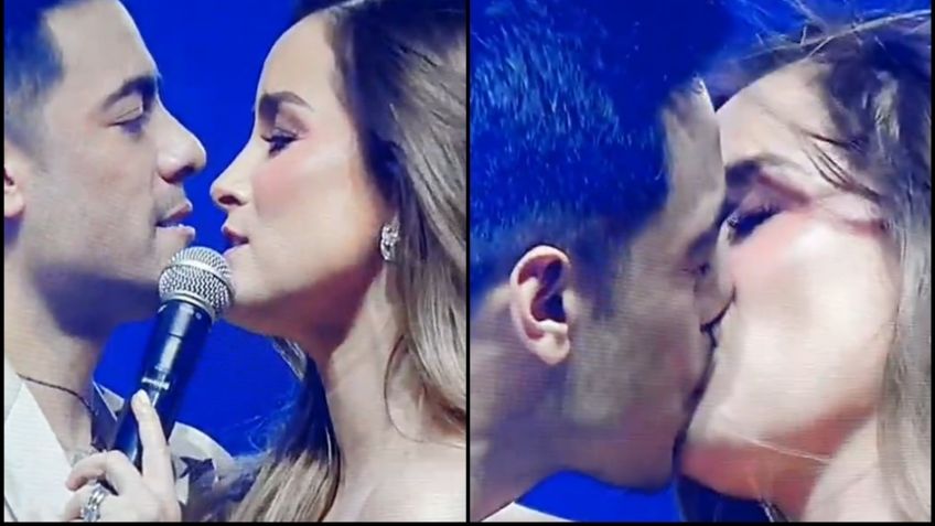 Carlos Rivera y Cynthia Rodríguez sellan su amor con apasionado beso en pleno concierto