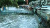 Foto ilustrativa de la nota titulada Fuertes lluvias desbordan ríos en Naucalpan; habitantes viven en el miedo