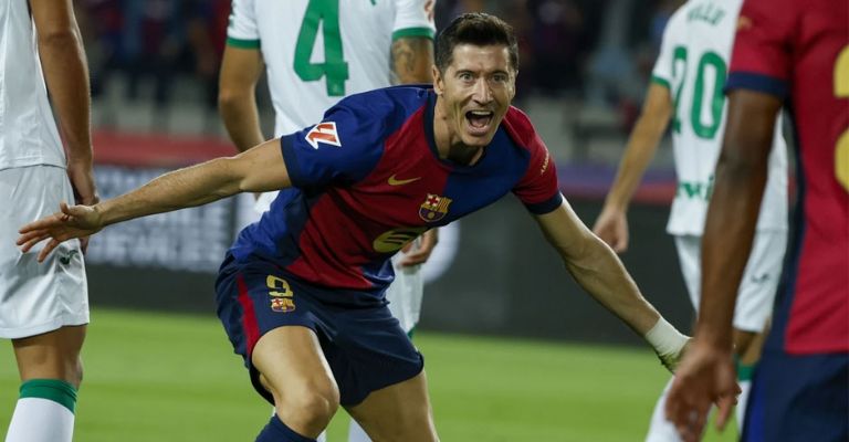 El polaco celebra el tanto que le dio el triunfo a su equipo