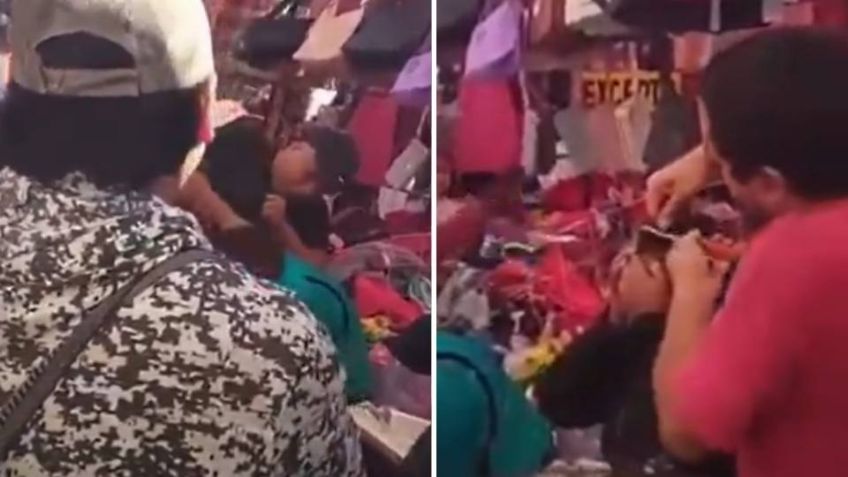 (VIDEO) Comerciantes detectan a presuntas ladronas y las rapan en un mercado de Puebla