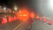 Foto ilustrativa de la nota titulada Caos en la autopista México-Cuernavaca: Tráiler sufre volcadura y se incendia en Tlalpan