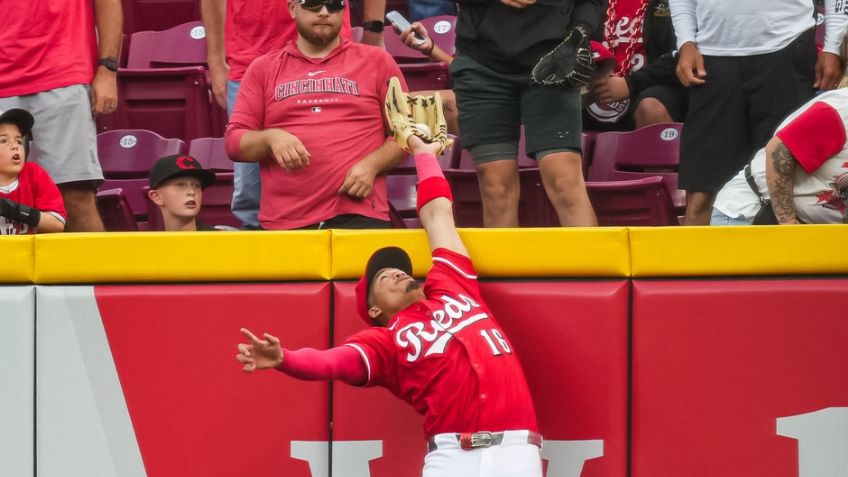 Marte se 'roba' un jonrón y los Reds ganan para seguir en la pelea por el comodín