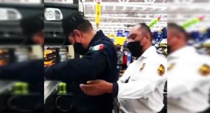 (VIDEO) 'Cachan' a policía que intentaba robar mercancía de supermercado