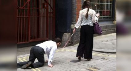 Mujer rompe toque de queda y saca a pasear a un hombre con correa; la multan