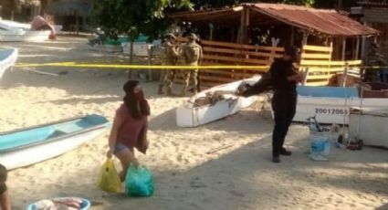 ¡Trágico! Asesinan a hombre en playa turística de Oaxaca; hallan su cuerpo en una lancha 
