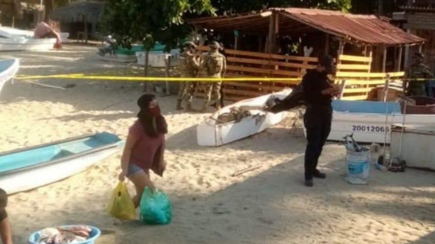 ¡Trágico! Asesinan a hombre en playa turística de Oaxaca; hallan su cuerpo en una lancha 