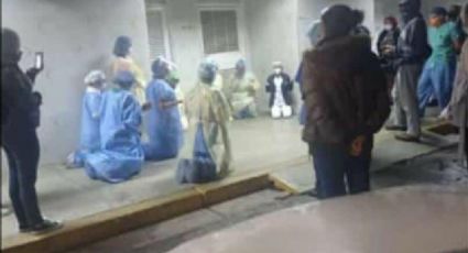 VIDEO: Hospital Covid-19 colapsa; médicos se arrodillan para orar por sus pacientes