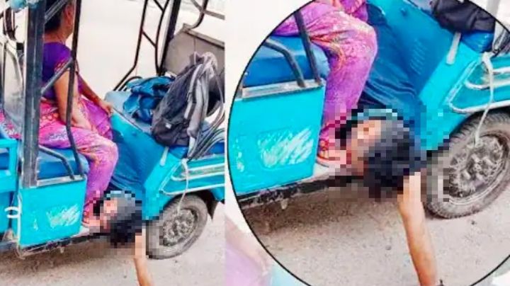 India: Madre traslada el cadáver de su hijo fallecido por Covid-19 en un mototaxi